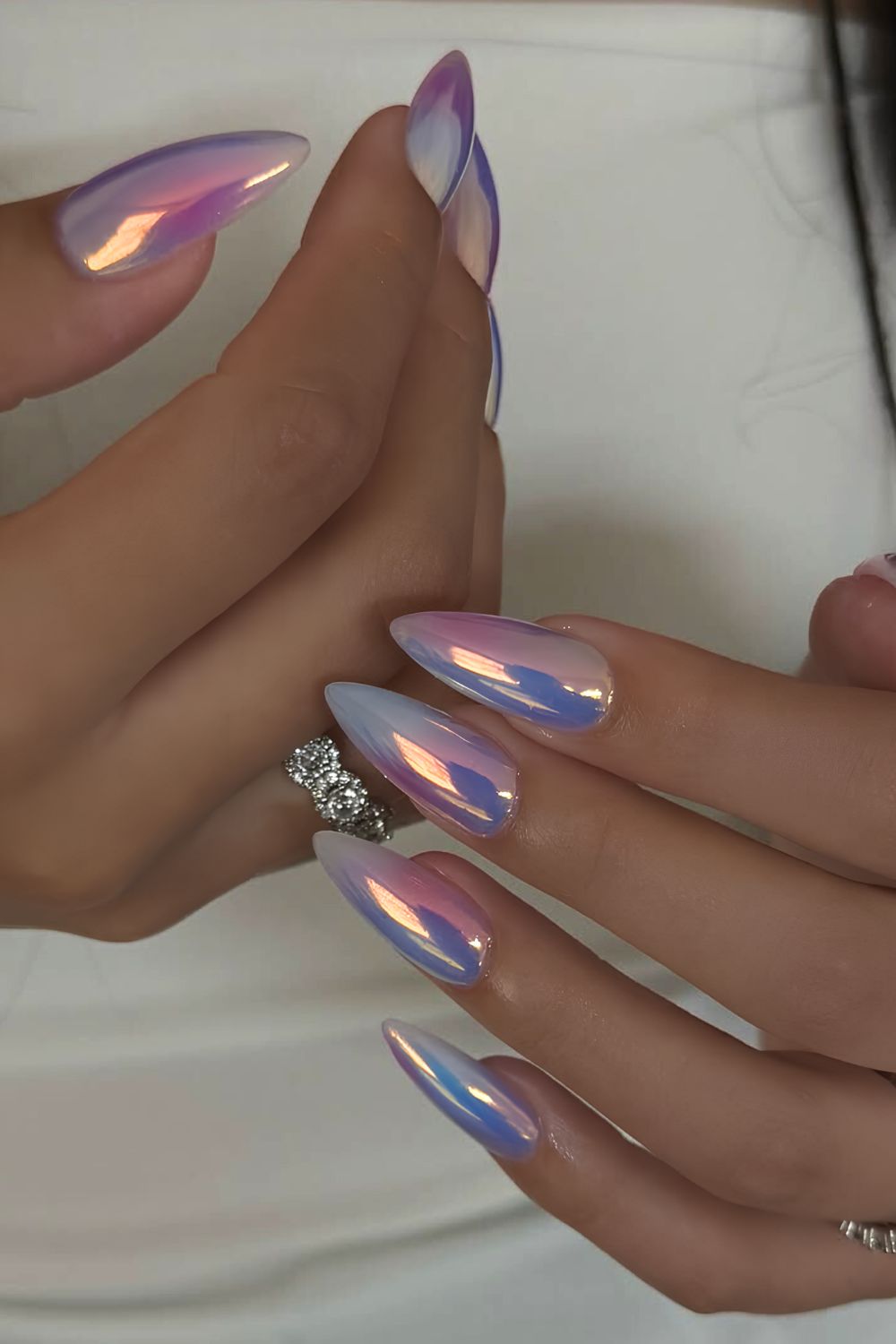 Pink and blue aurora nails with aura effect