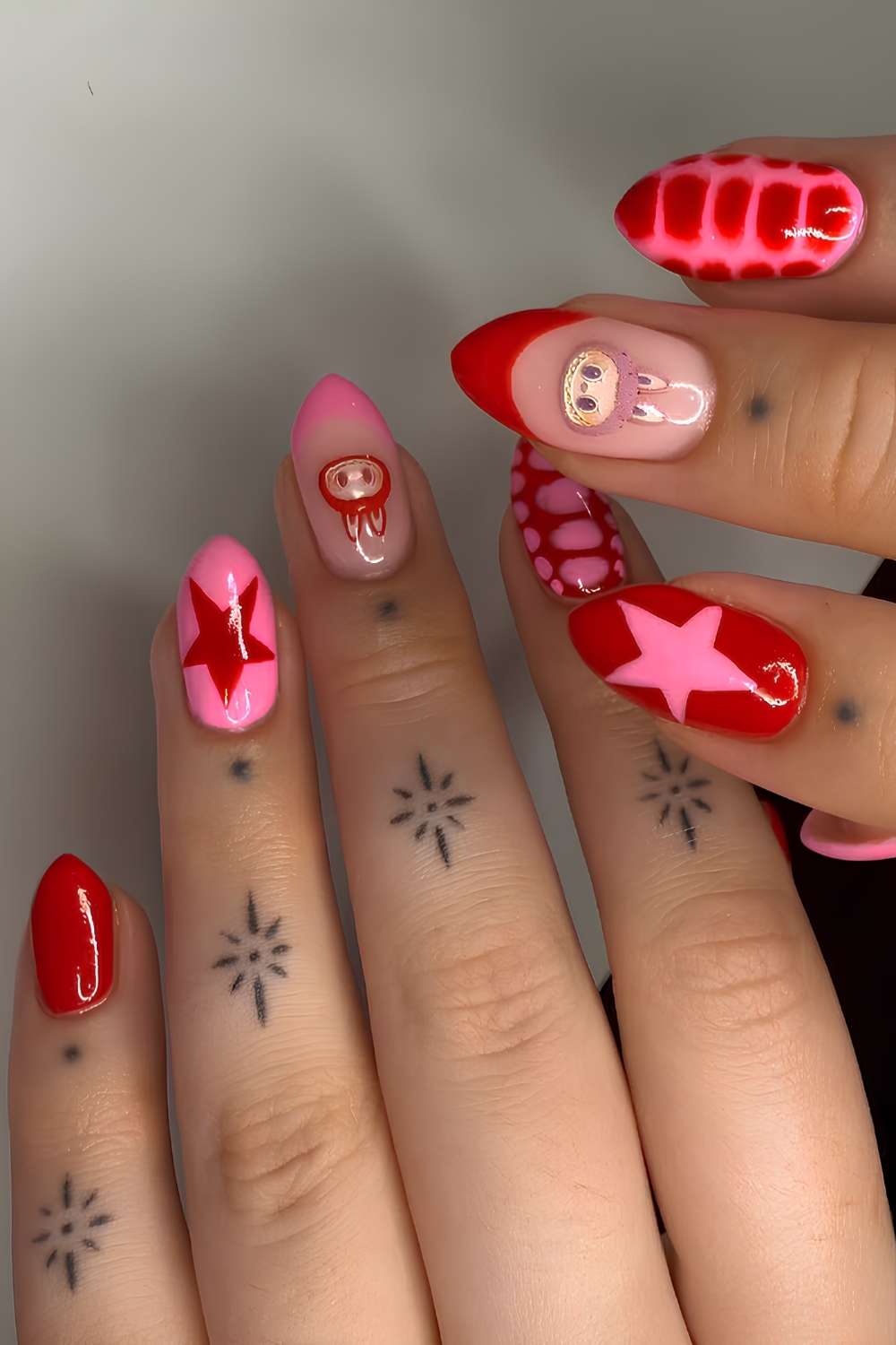 Pink and red Labubu nails