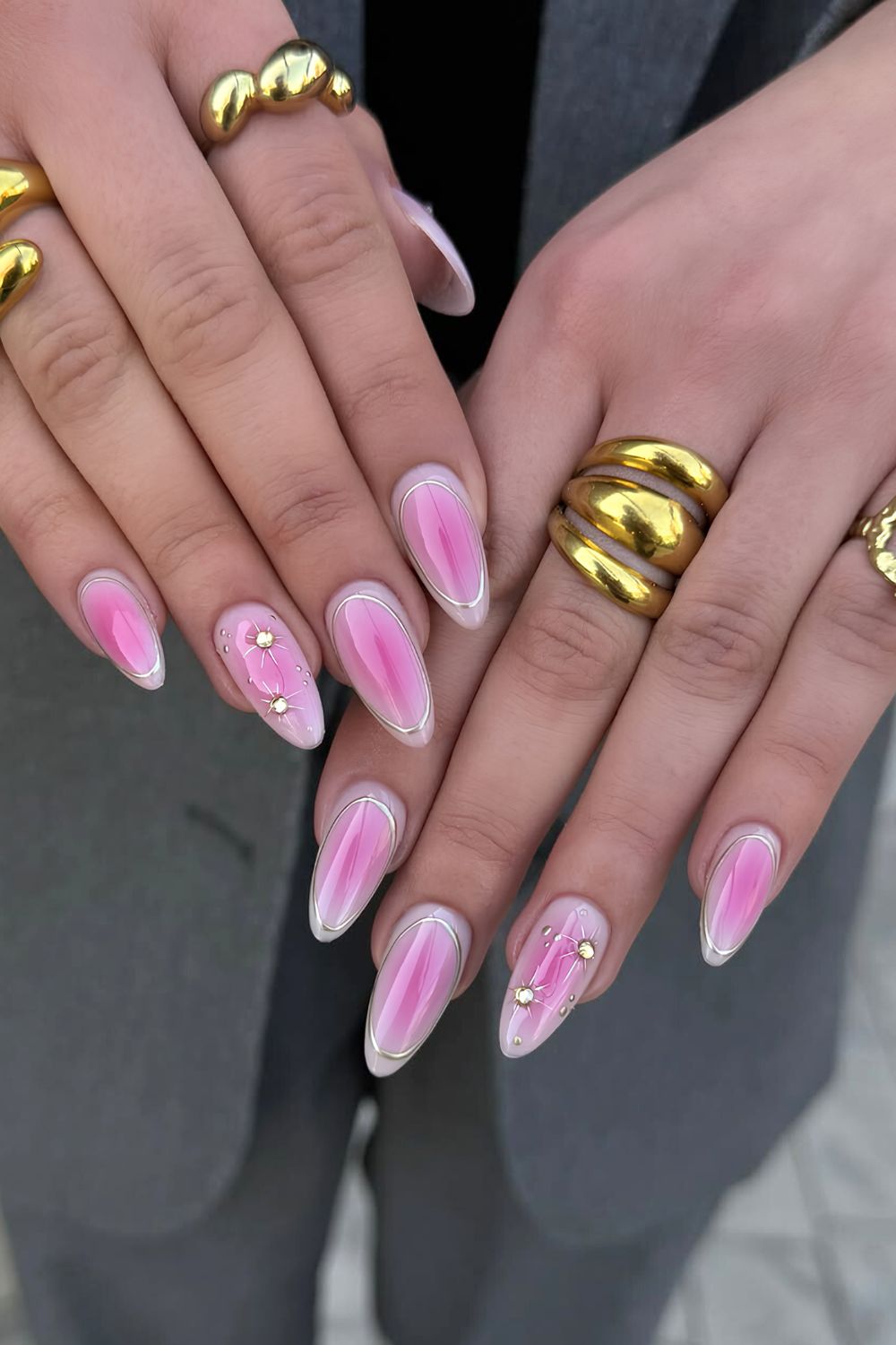 Pink aura nails with silver chrome accents