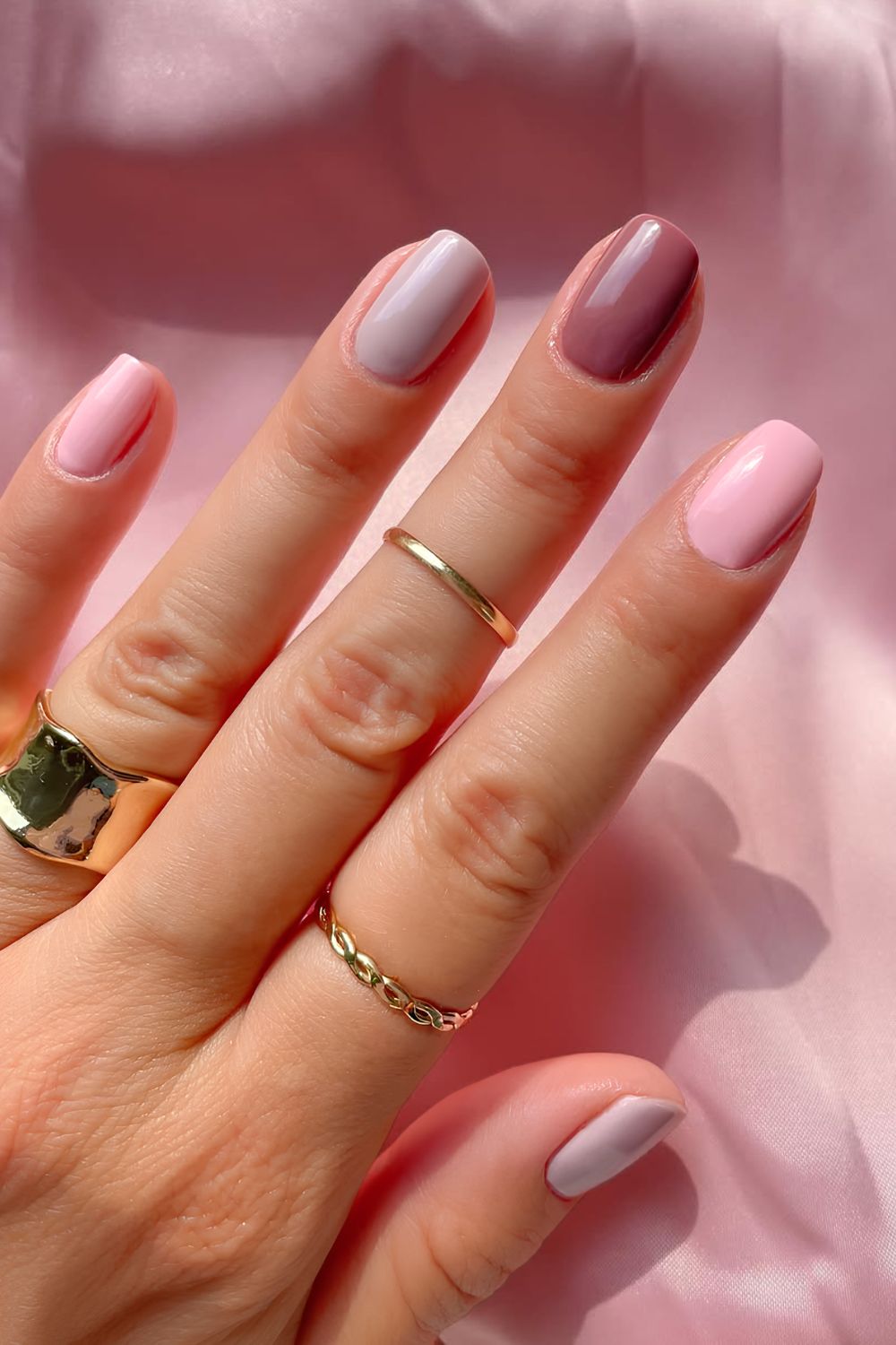 Pink, gray and mauve skittle nails