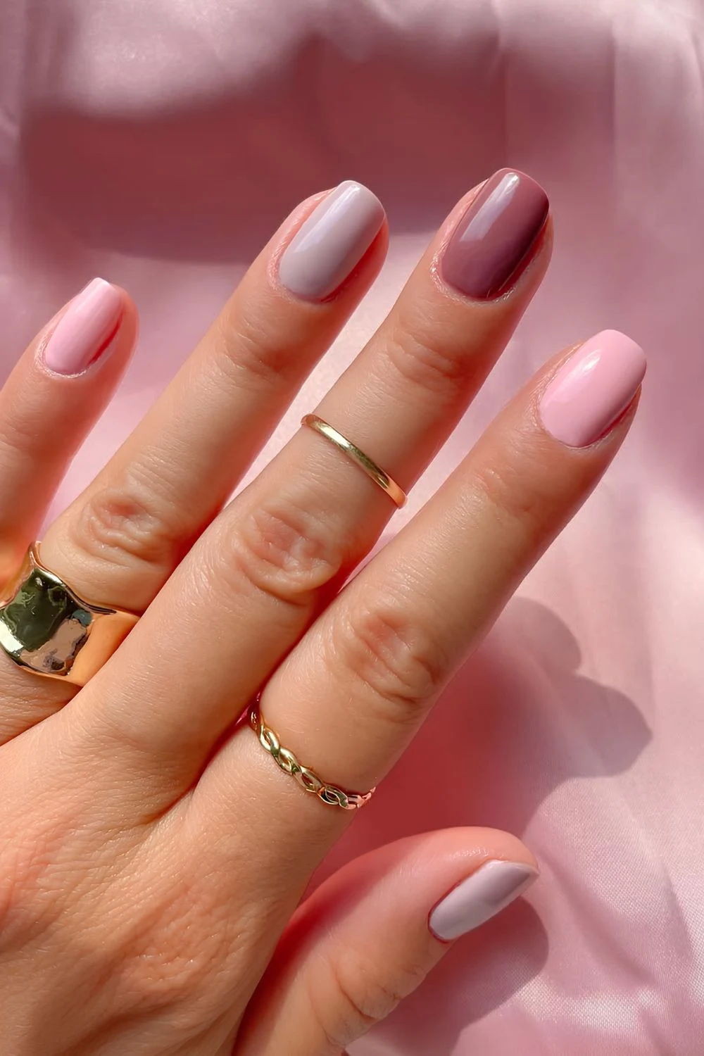 Pink, gray and mauve skittle nails