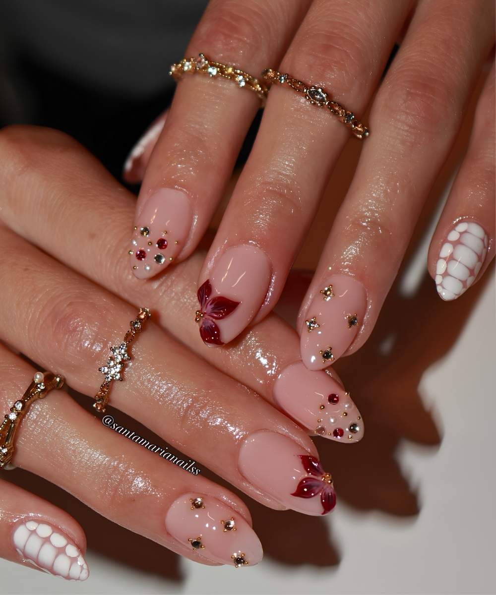 Sheer mani with burgundy flowers and white animal print