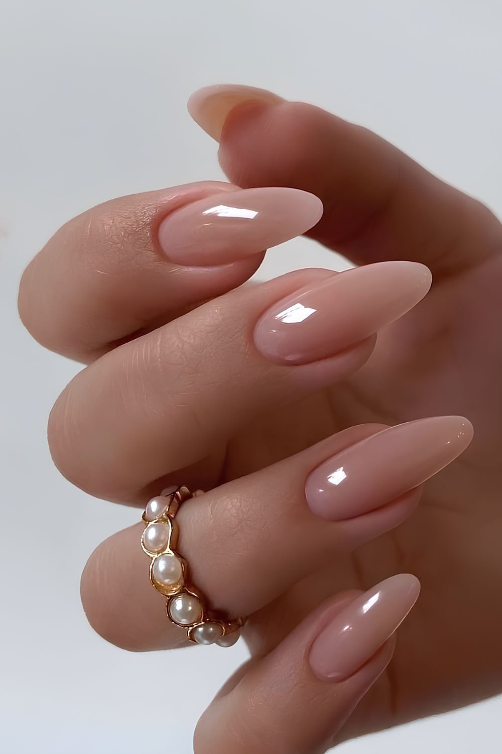Sheer neutral nails with a soft beige tint