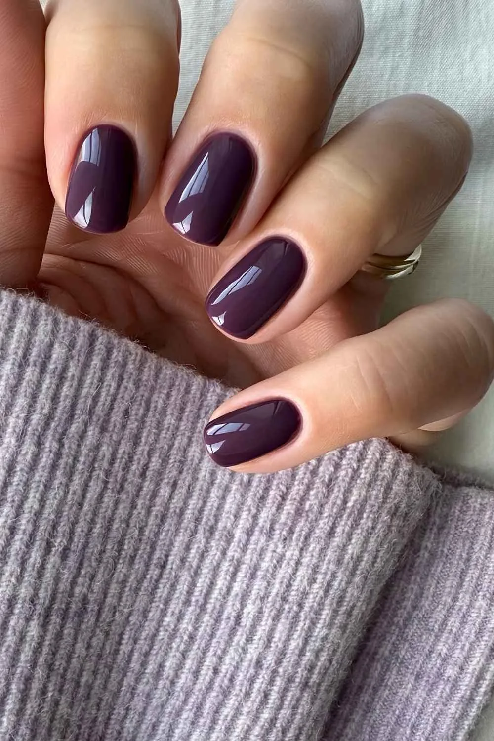 Short berry purple manicure