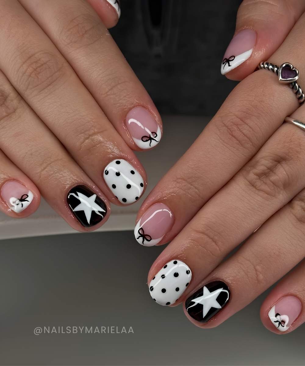 Short black and white mani with dots and stars