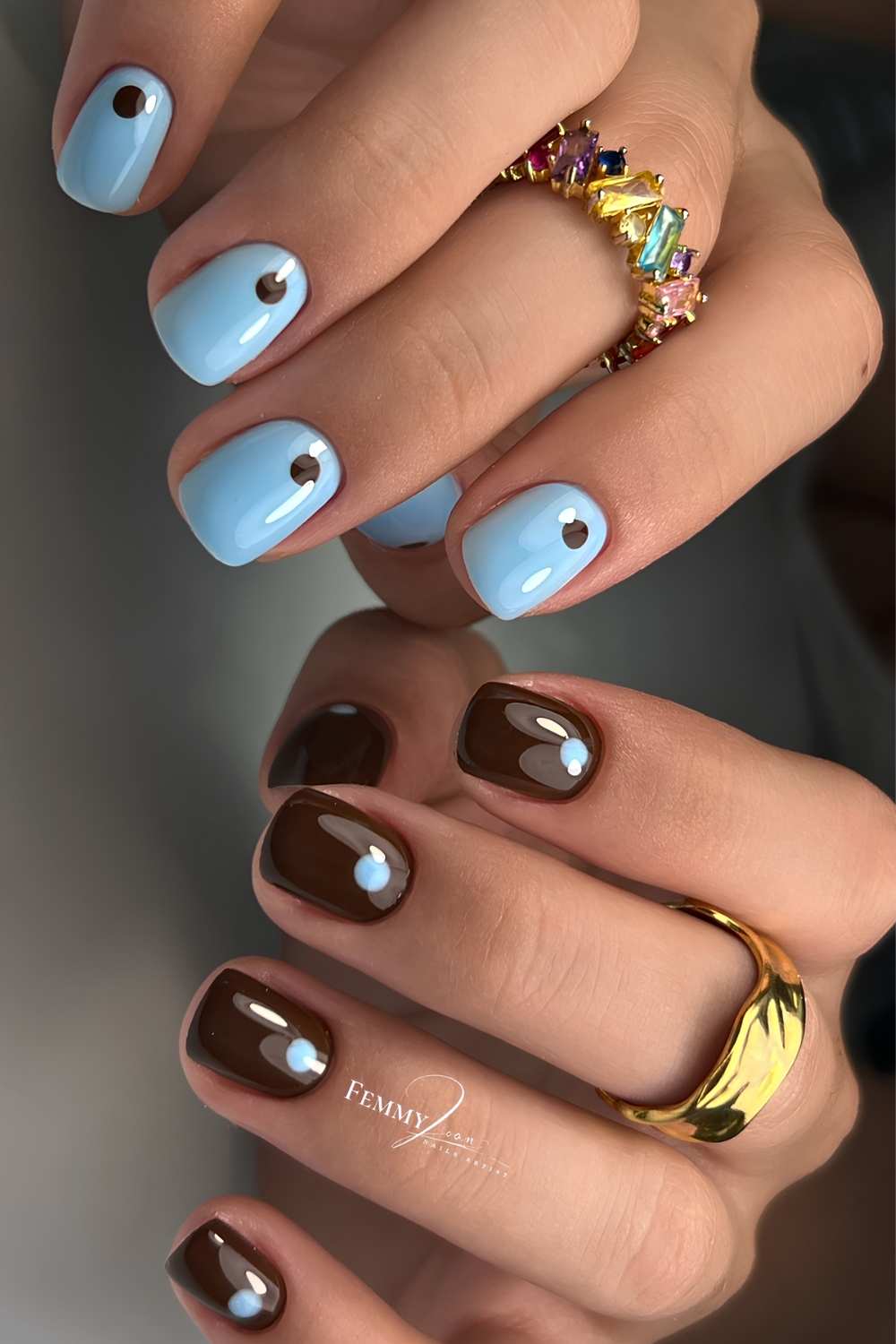 Short blue and brown nails with minimalist dots