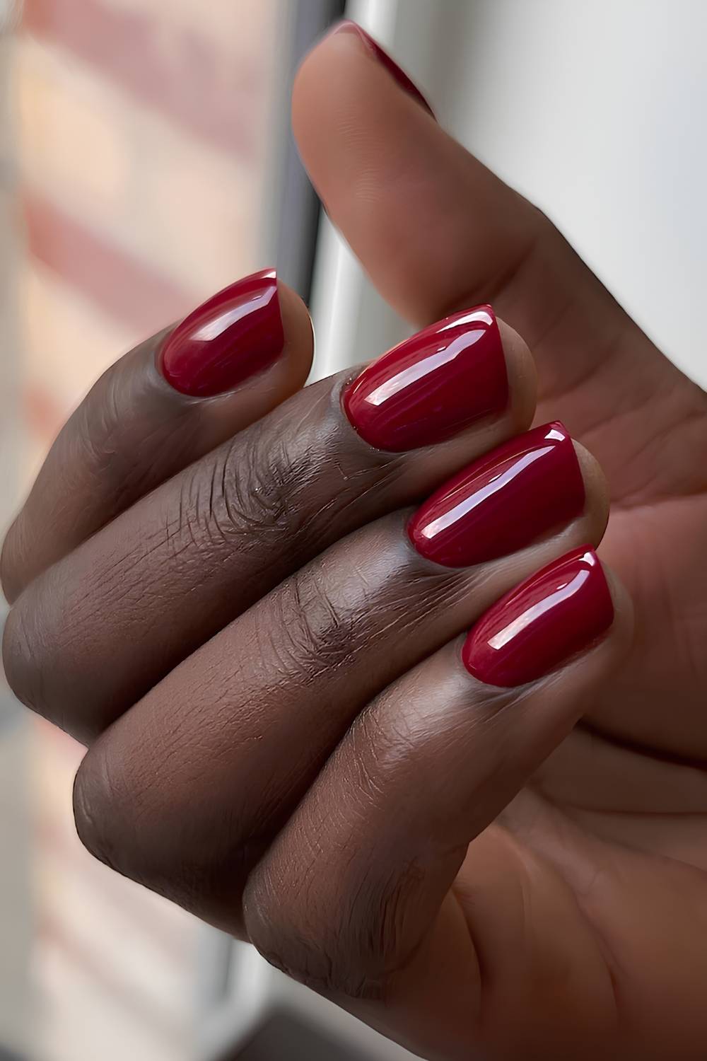 Short cherry red manicure