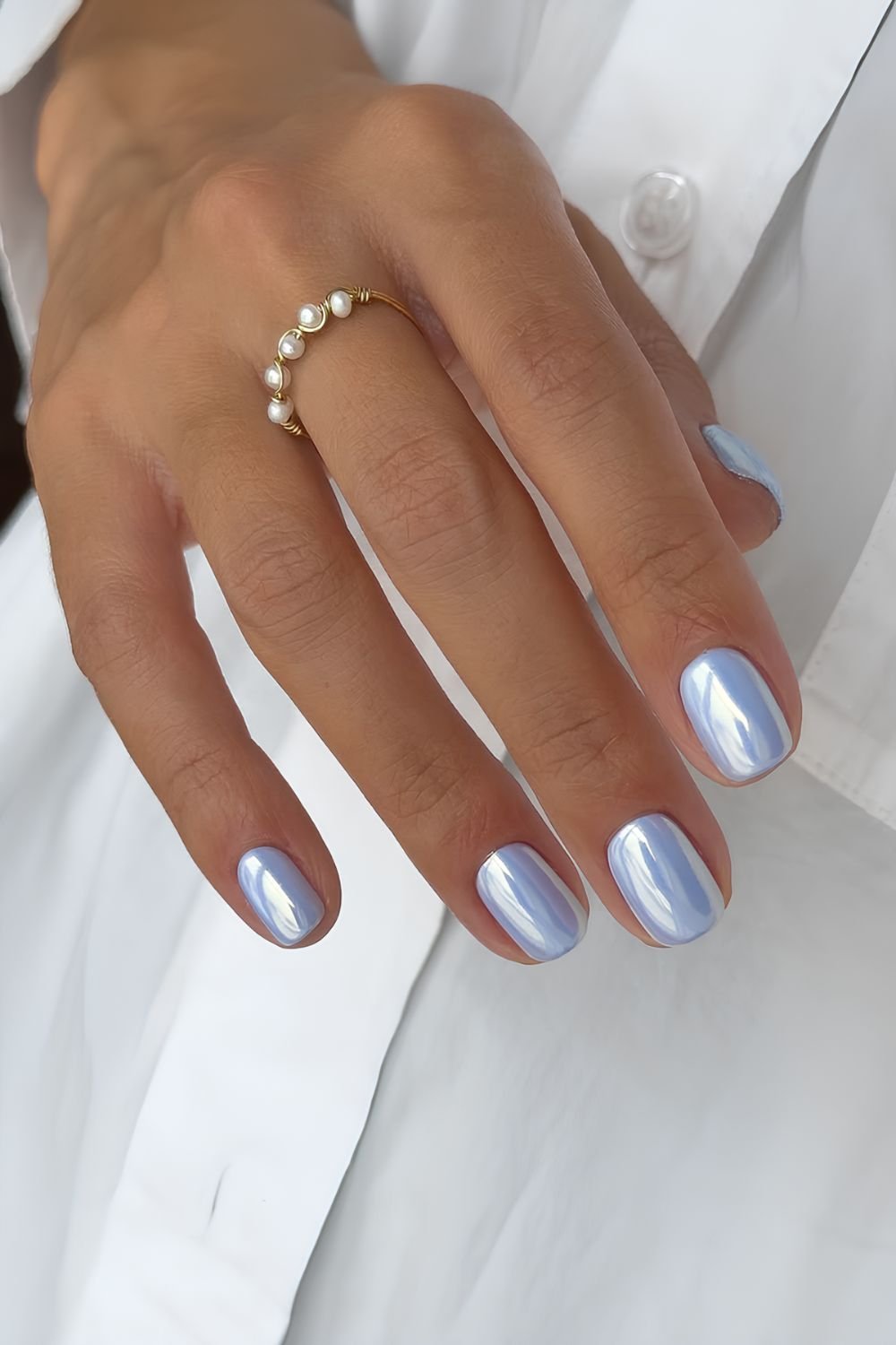 Short light blue chrome nails