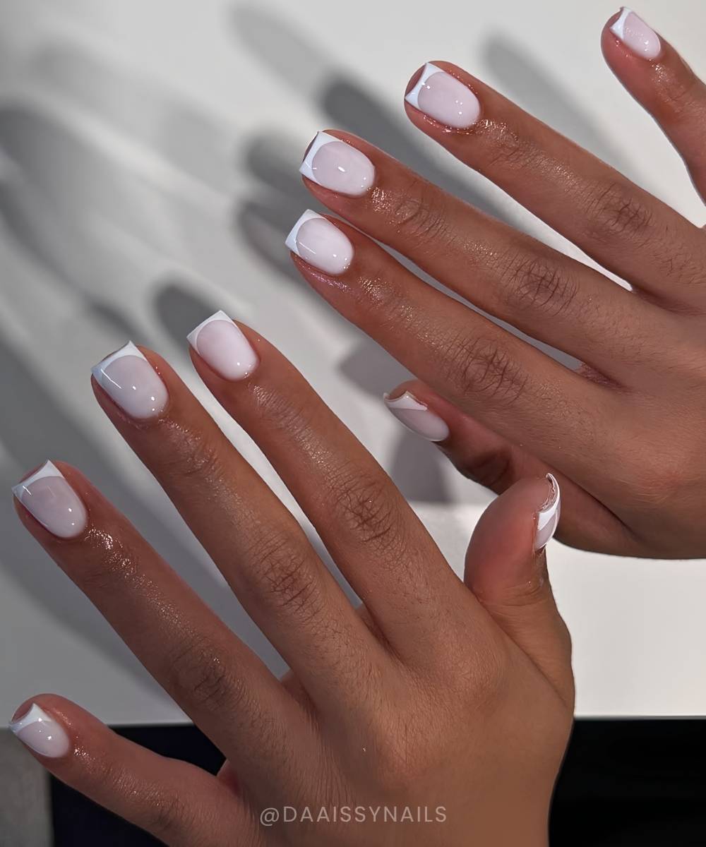 Short milky nails with white micro French tips