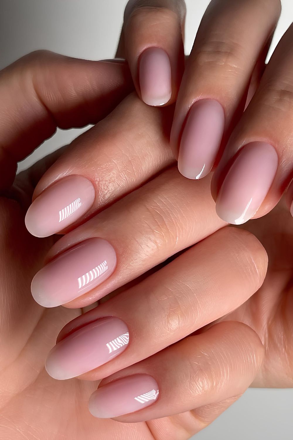 Soft pink and glossy almond mani
