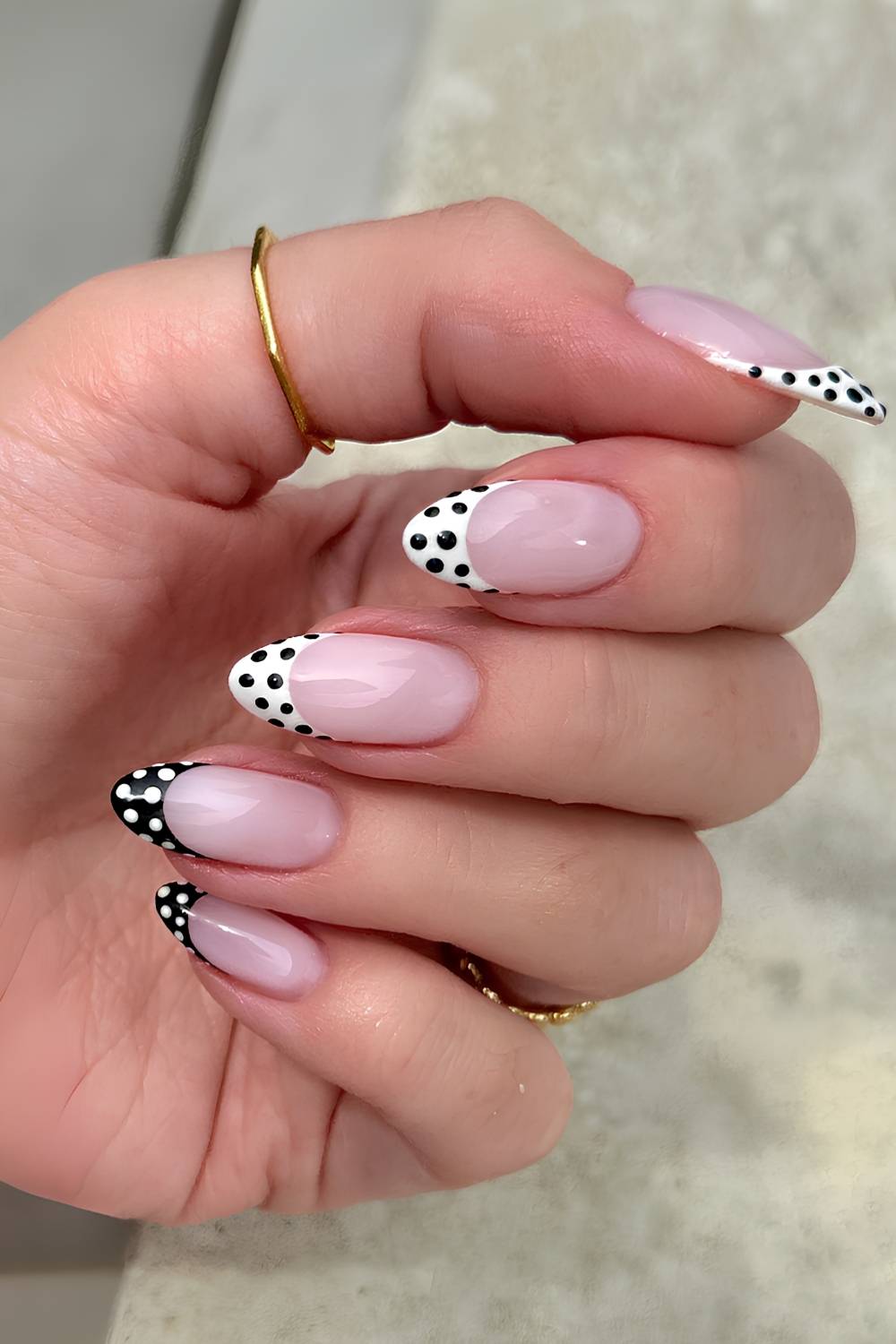 White and black French mani with polka dots
