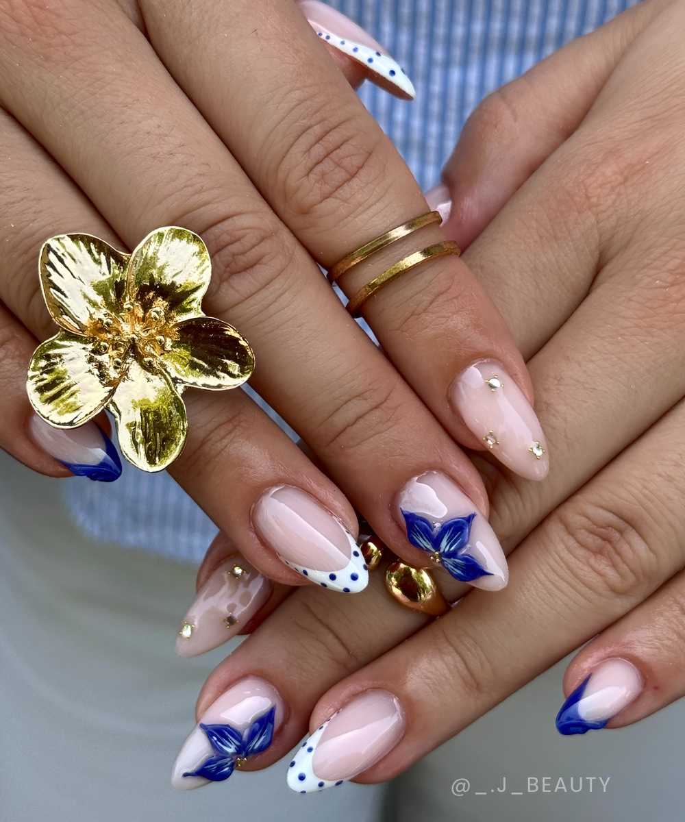White and blue French mani with flowers and gems