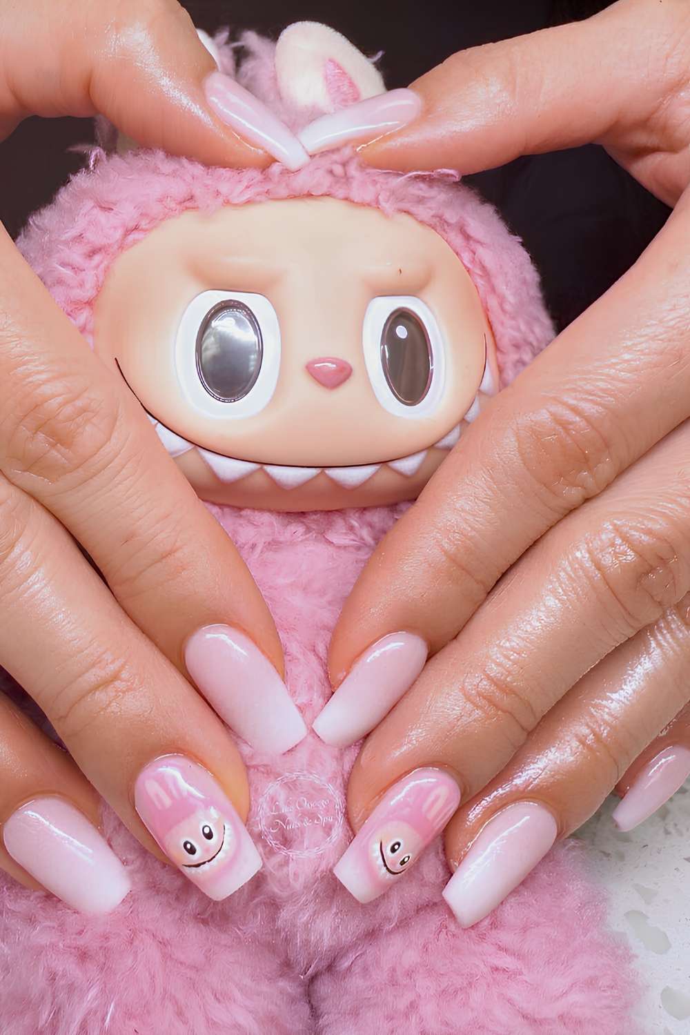 White ombre nails with labubu stickers