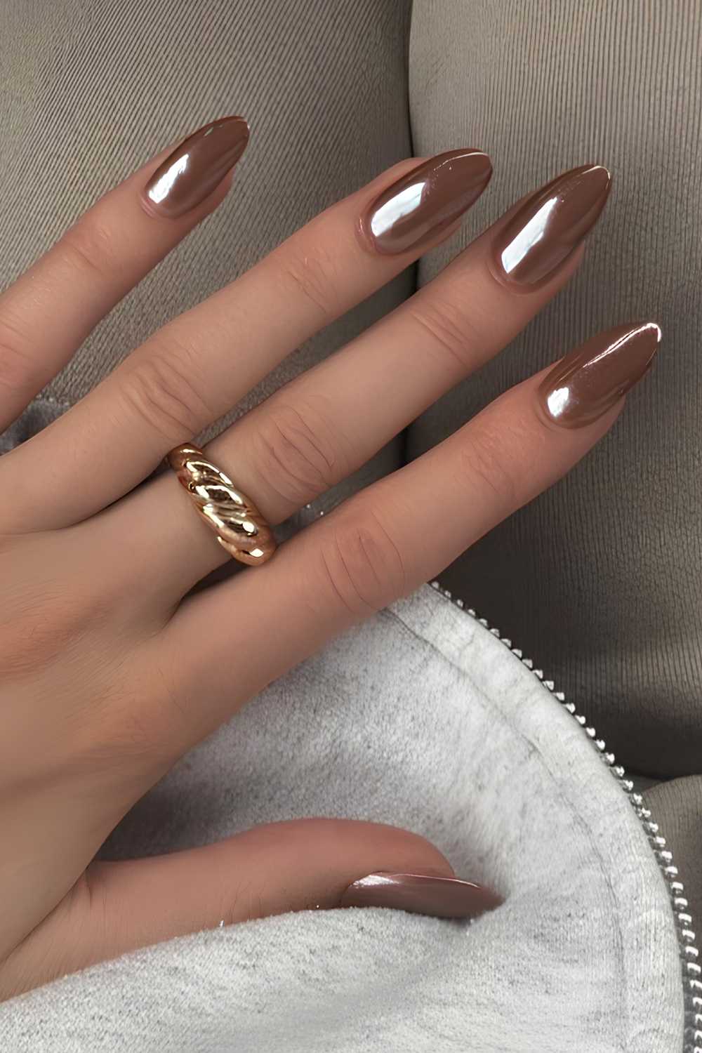 Almond shaped brown chrome nails