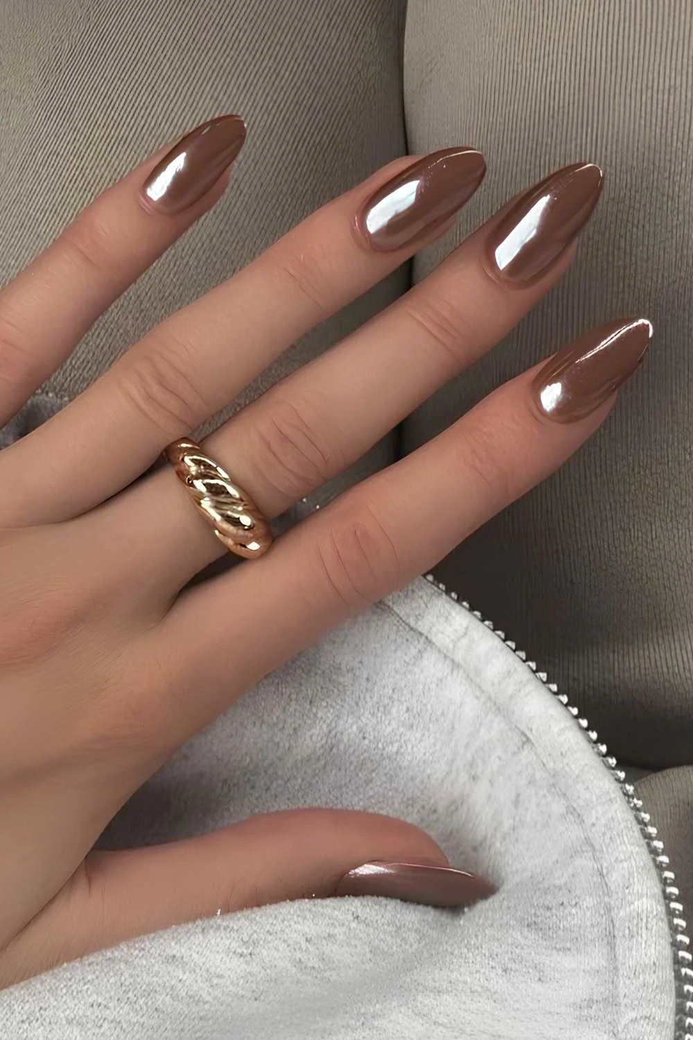 Almond shaped brown chrome nails