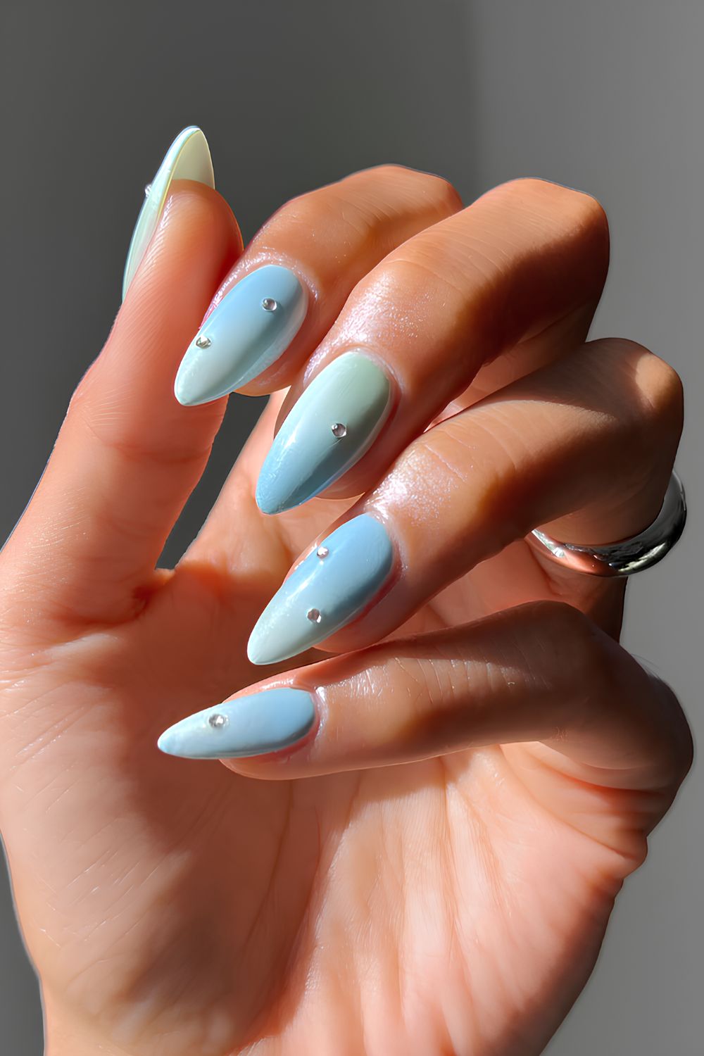 Aquamarine ombre nails with rhinestones