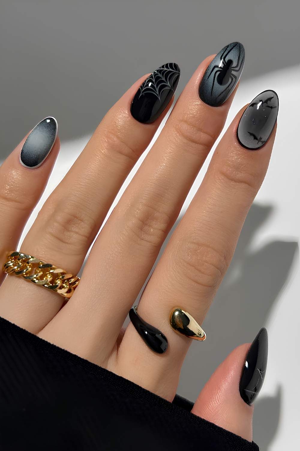 Black Halloween mani with spider accents