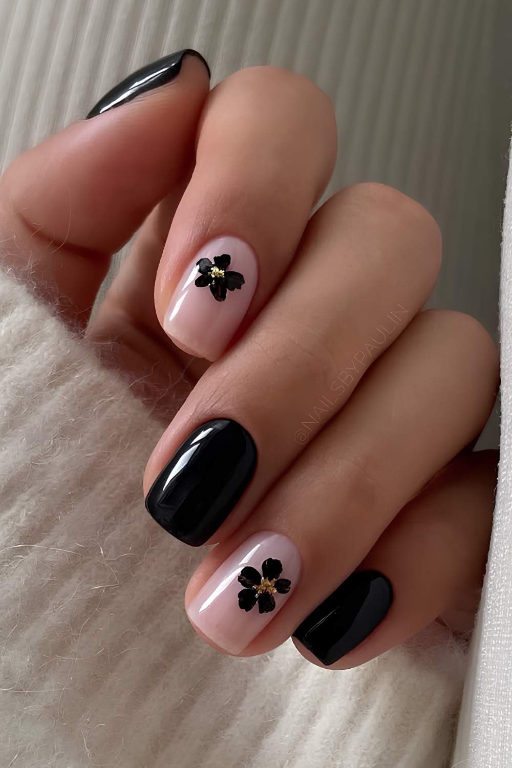 Black and milky pink nails with black flower art