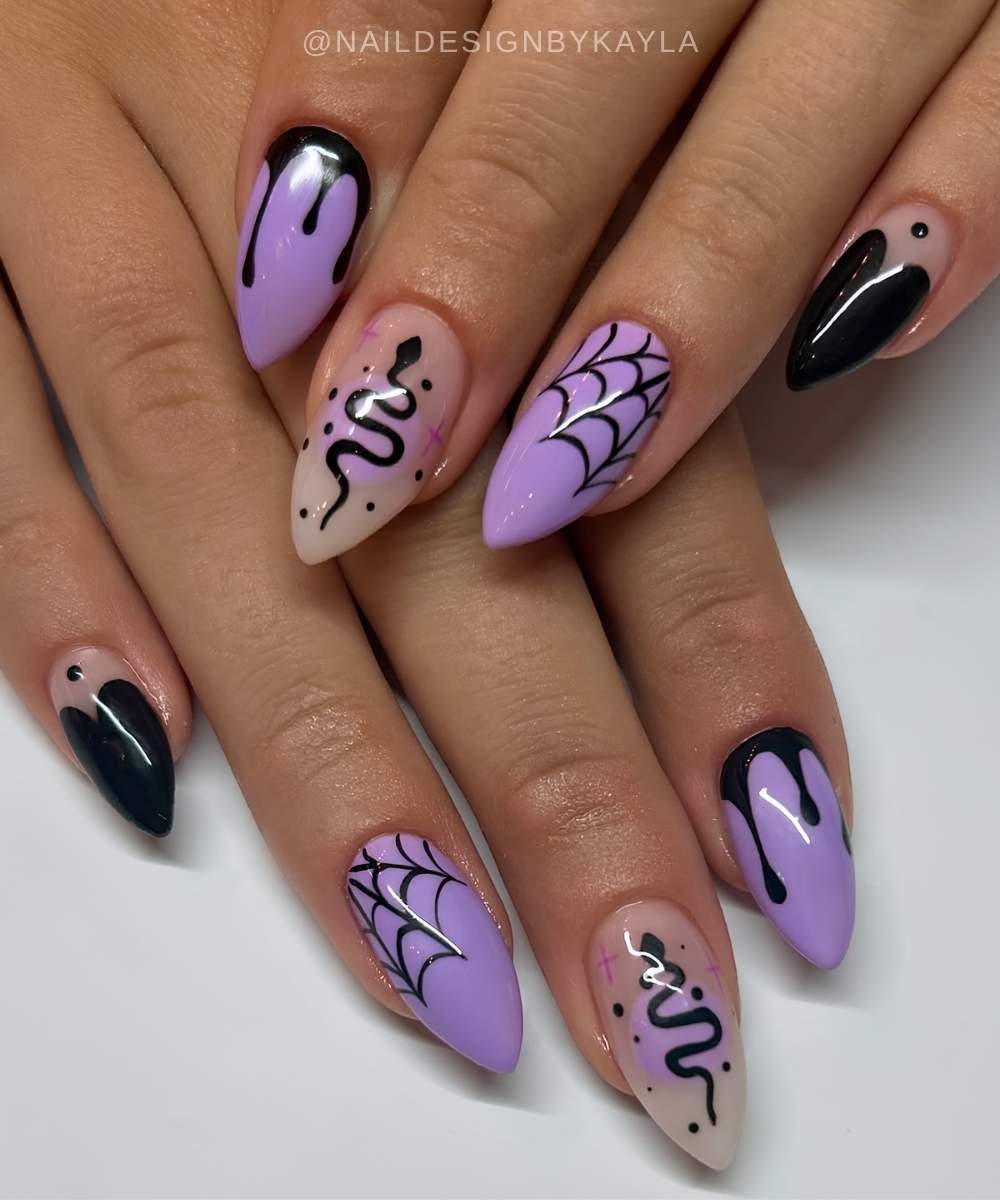 Black and purple Halloween manicure