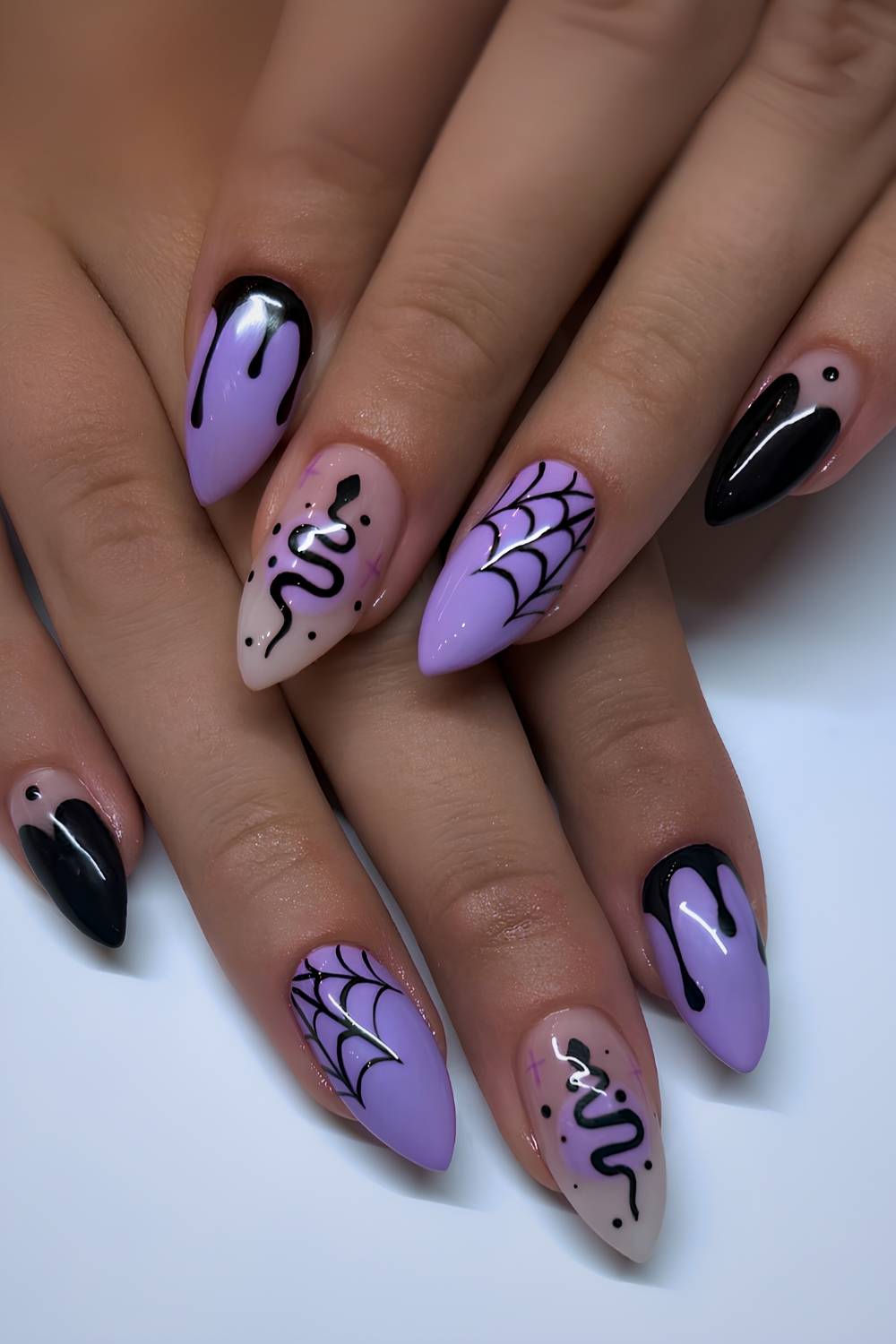 Black and purple Halloween nail art