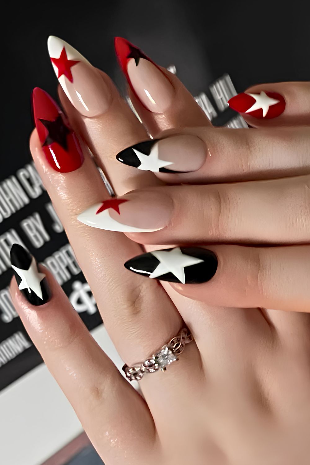 Black and red mani with starry art