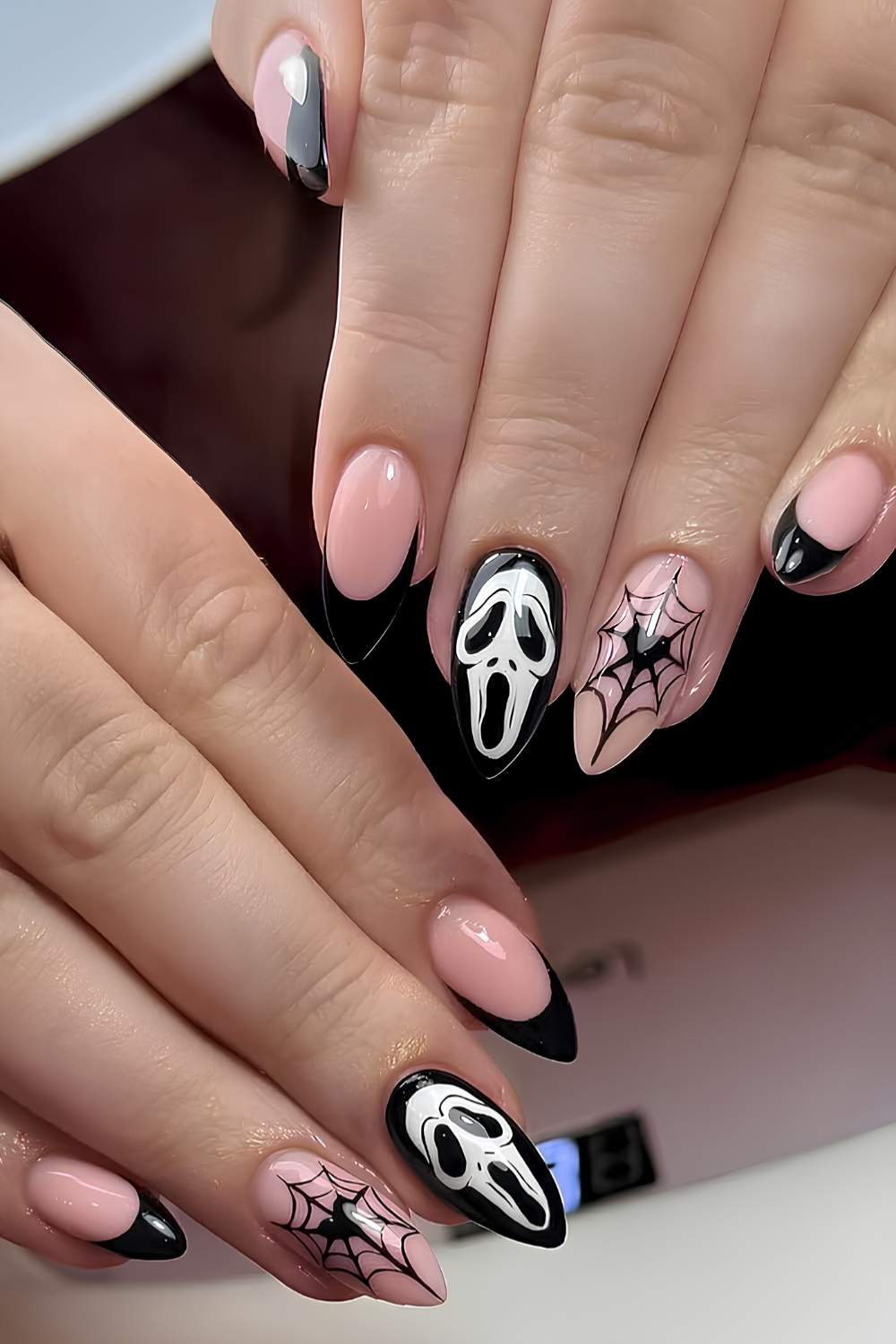 Black and white Ghostface nail design