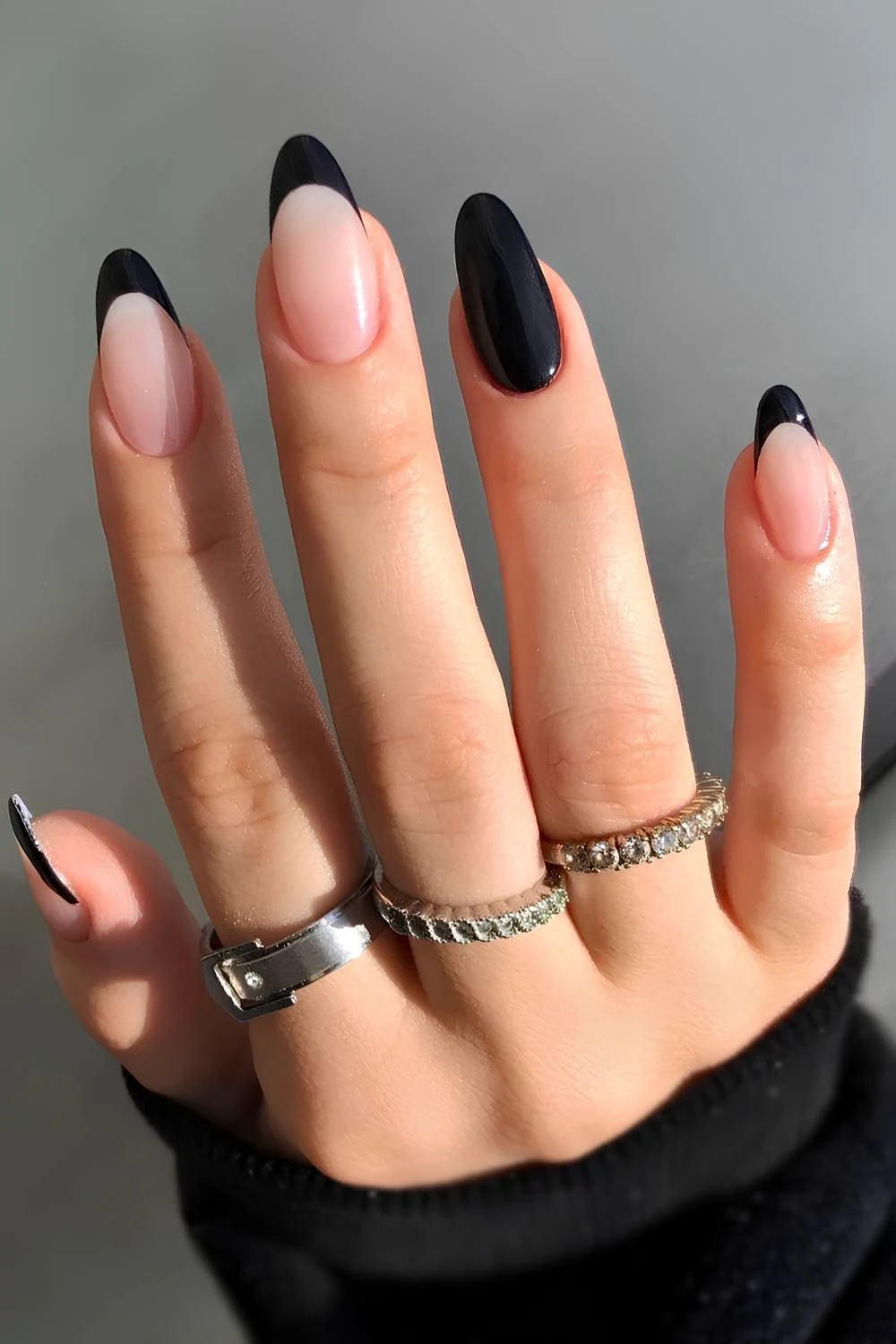 Black manicure with mixed layout