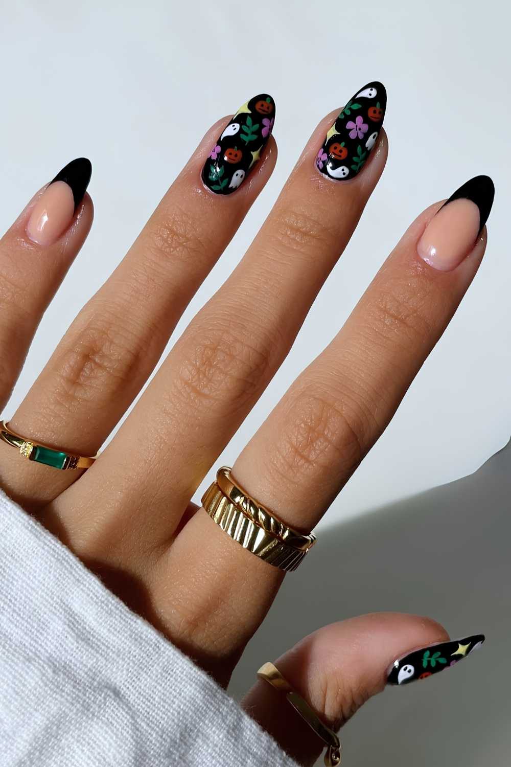 Black nails with micro spooky season art