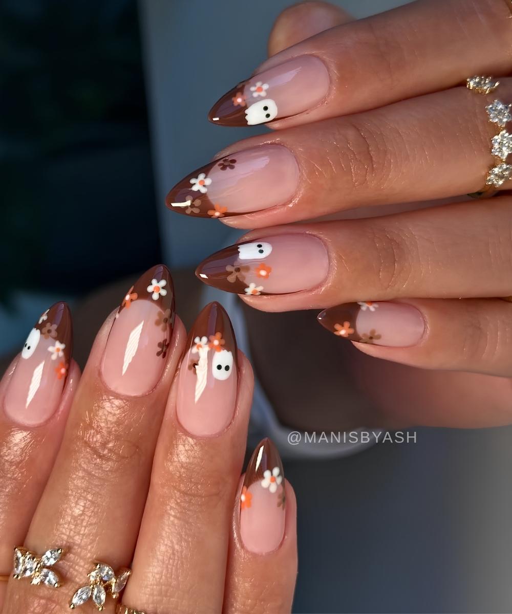 Brown French nails with ghosts and flowers