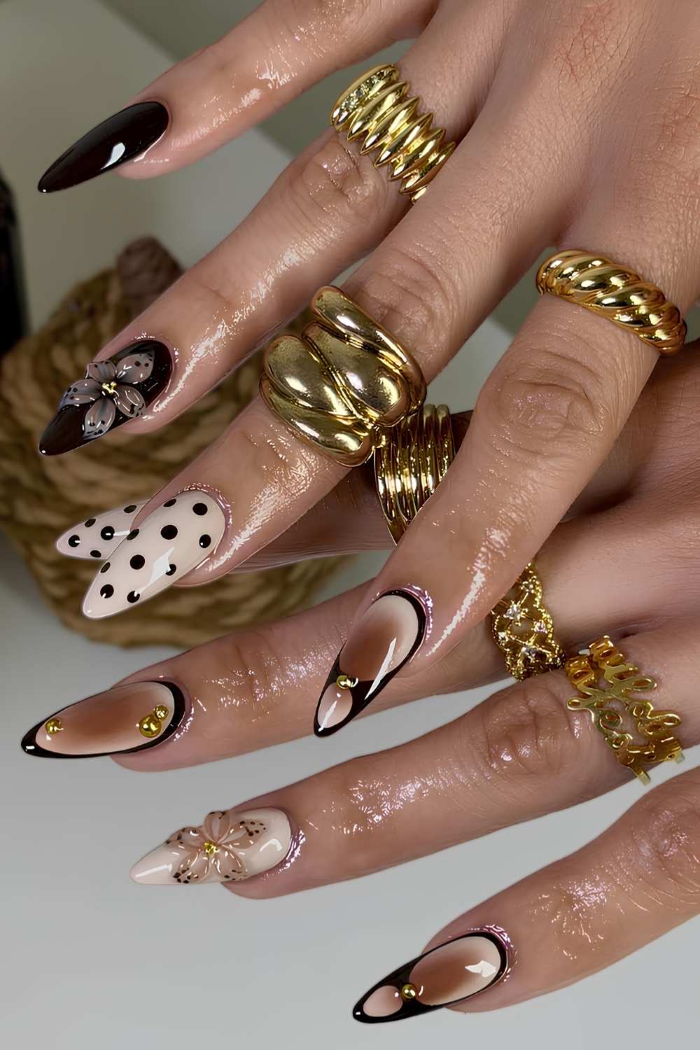 Brown and beige nails with flowers and polka dots