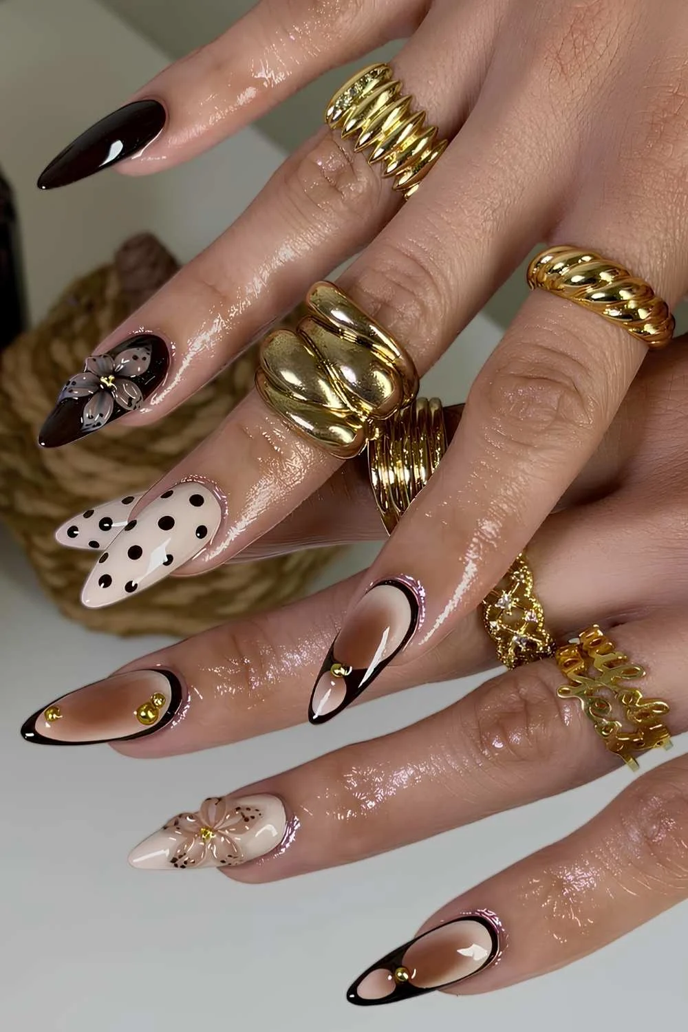 Brown and beige nails with flowers and polka dots
