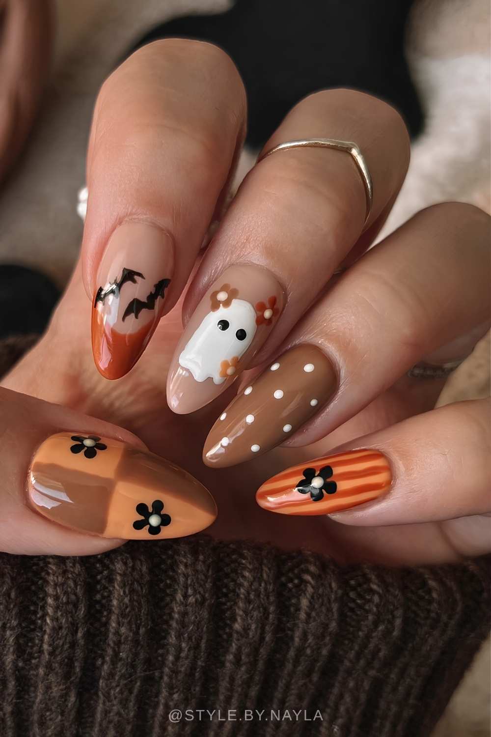 Brown and orange Halloween themed nails