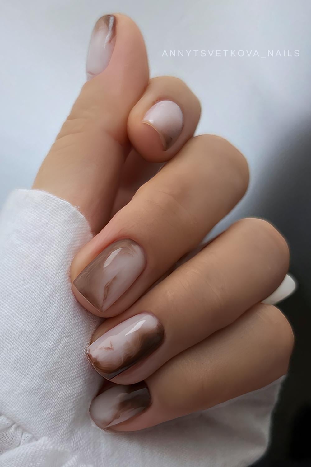 Brown and white marble nails