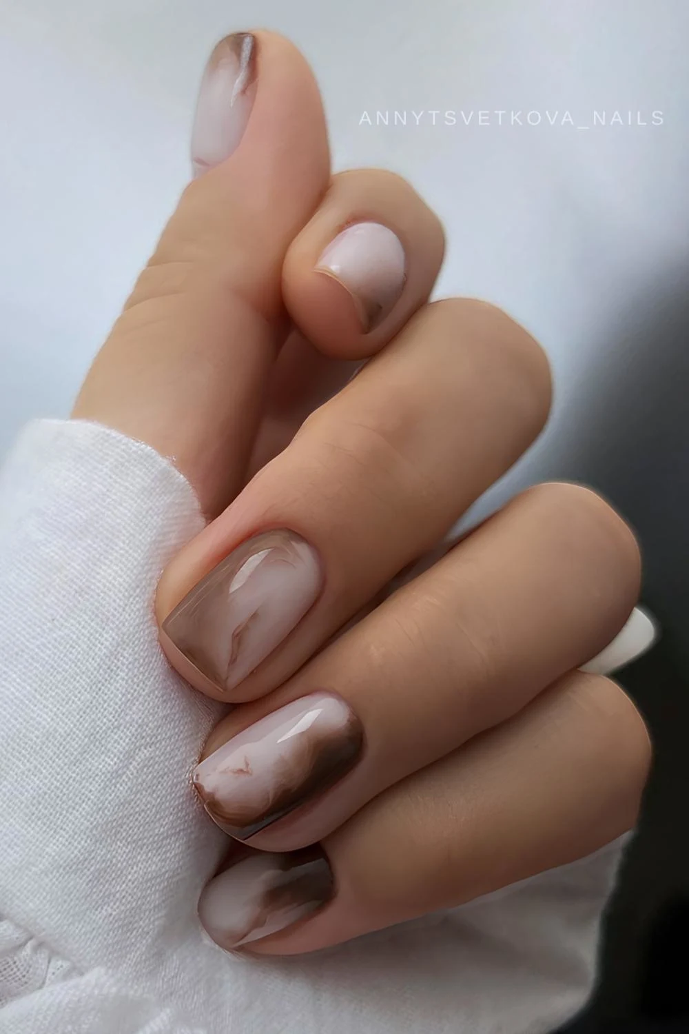 Brown and white marble nails