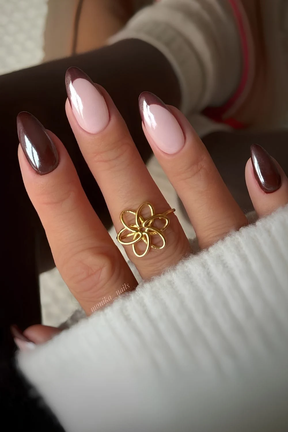 Brown chrome nails with accent French tips