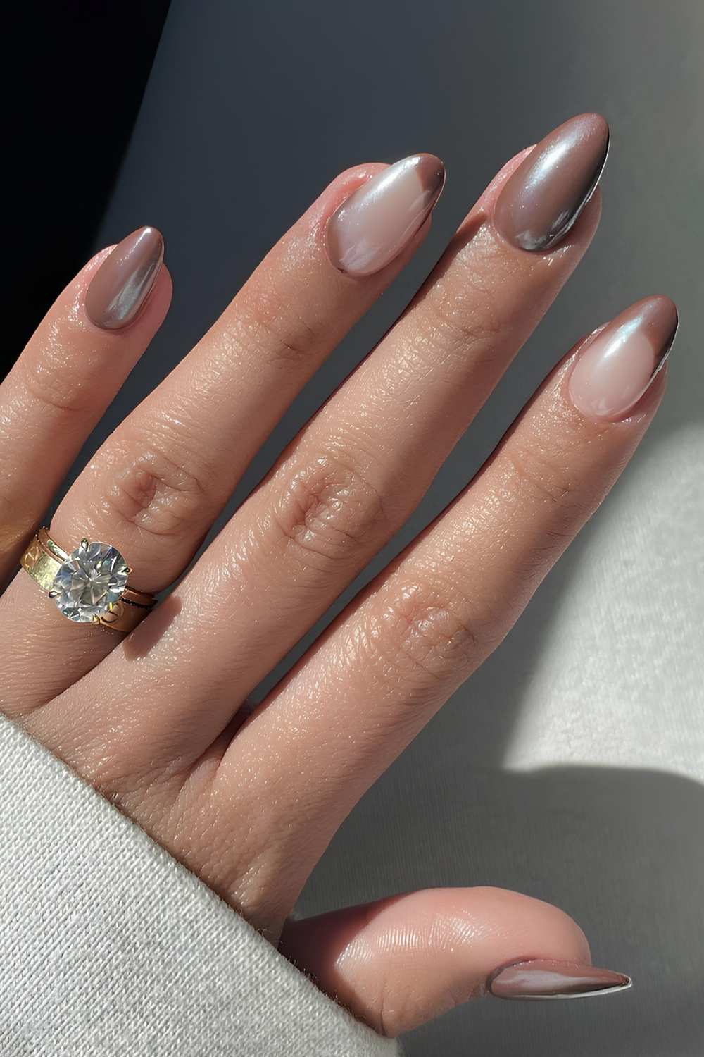 Brown chrome nails with negative space design