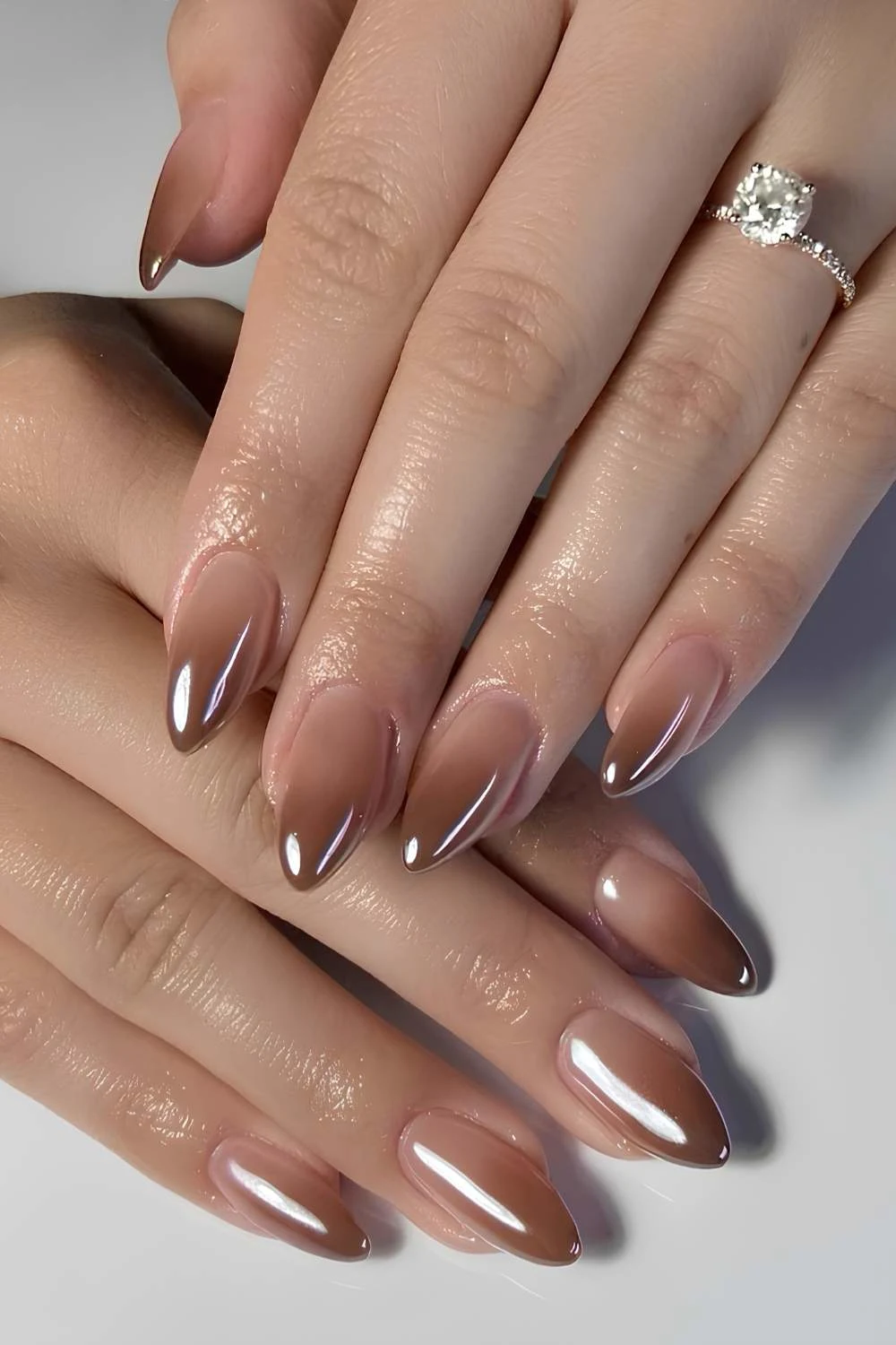 Brown ombre nails with chrome finish