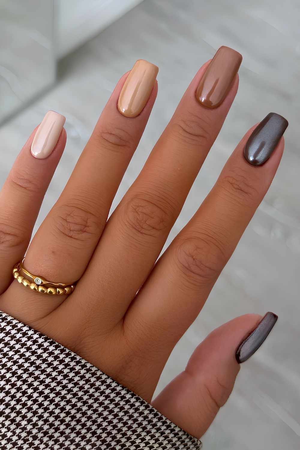 Brown skittle chrome manicure