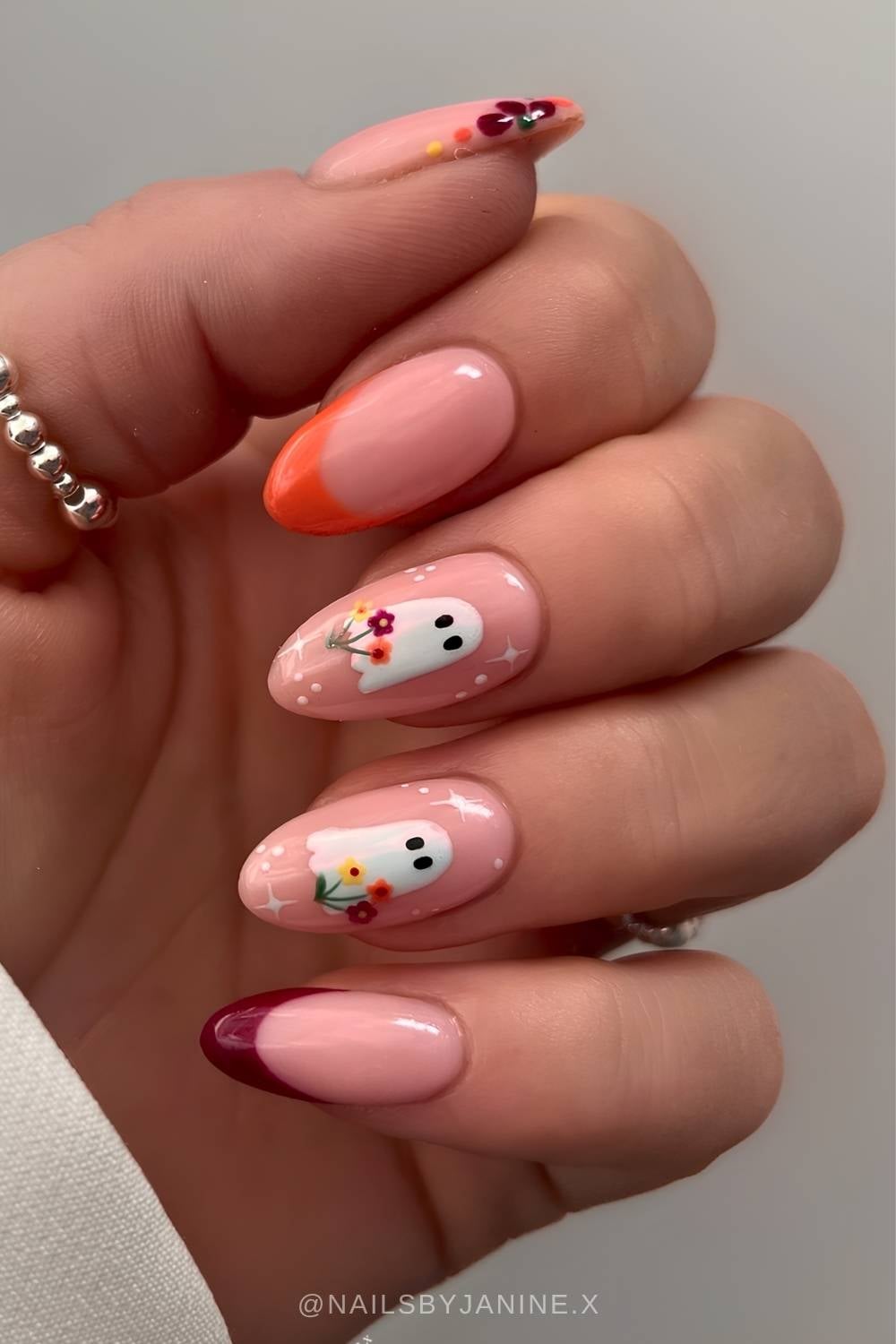 Burgundy and orange nails with cute ghost art