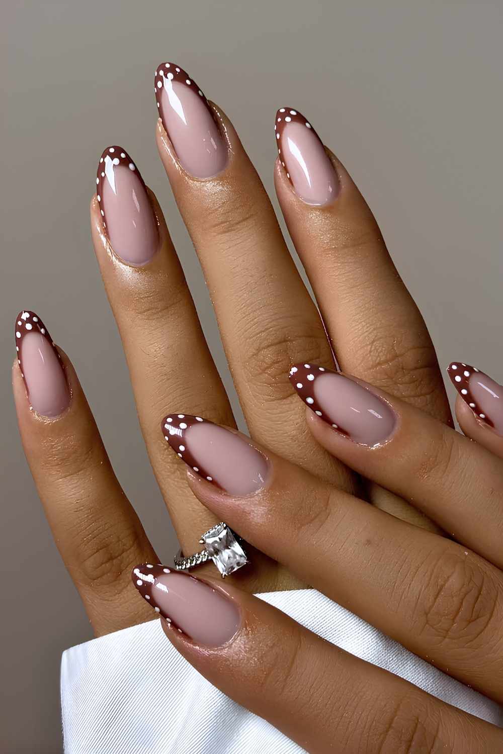Chestnut brown French mani with polka dots