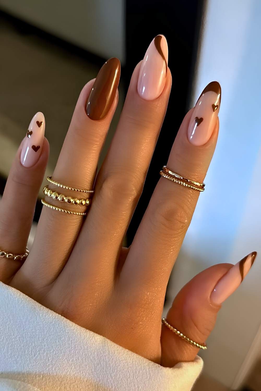 Chestnut brown nails with heart art