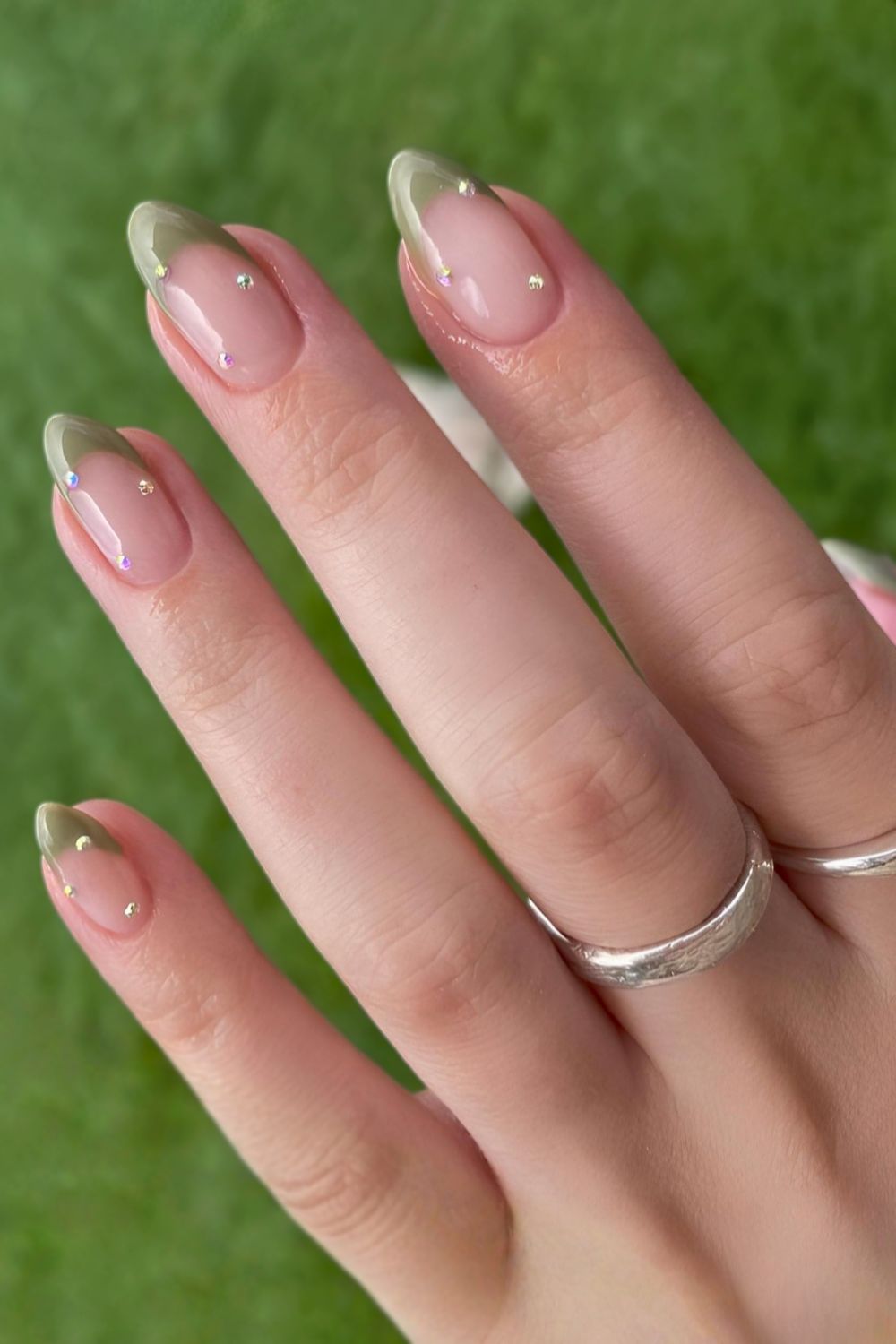 Earthy green French mani with rhinestones