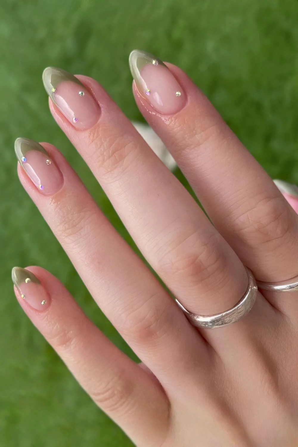 Earthy green French mani with rhinestones