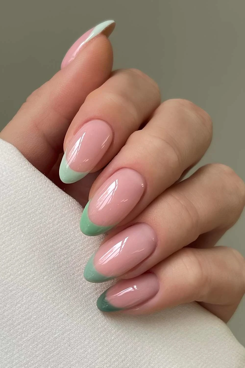 French manicure in different shades of green