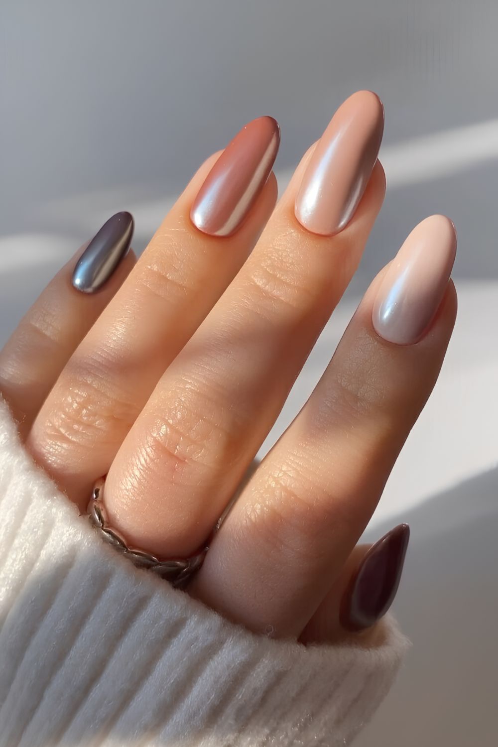 Glazed skittle nails in different shades of brown