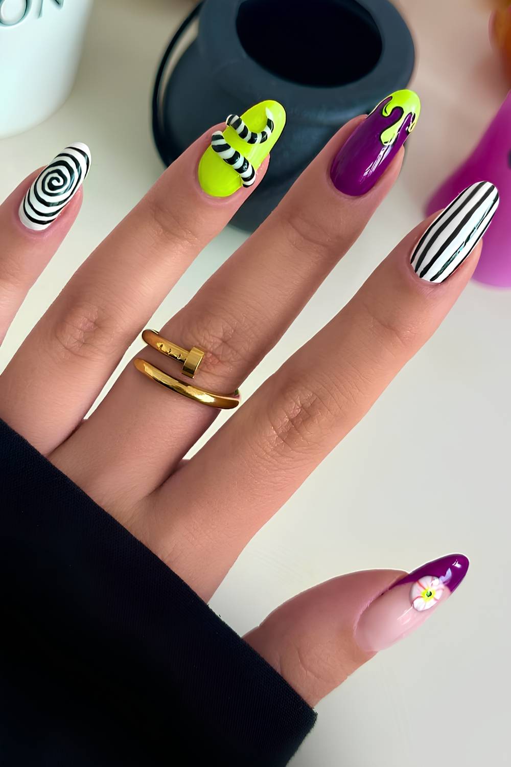 Green and purple Beetlejuice inspired nails