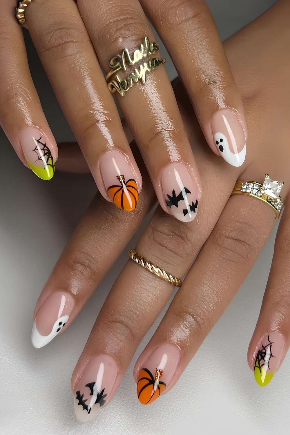 Halloween French mani with pumpkin and bat art