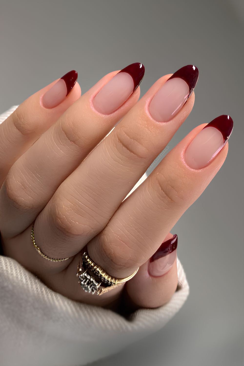 Maroon French tip nails