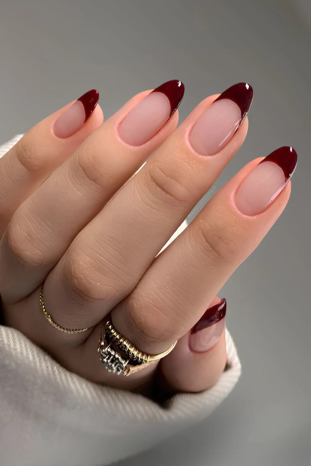 Maroon French tip nails