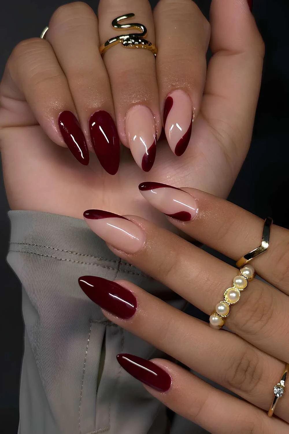 Maroon nails with negative space design